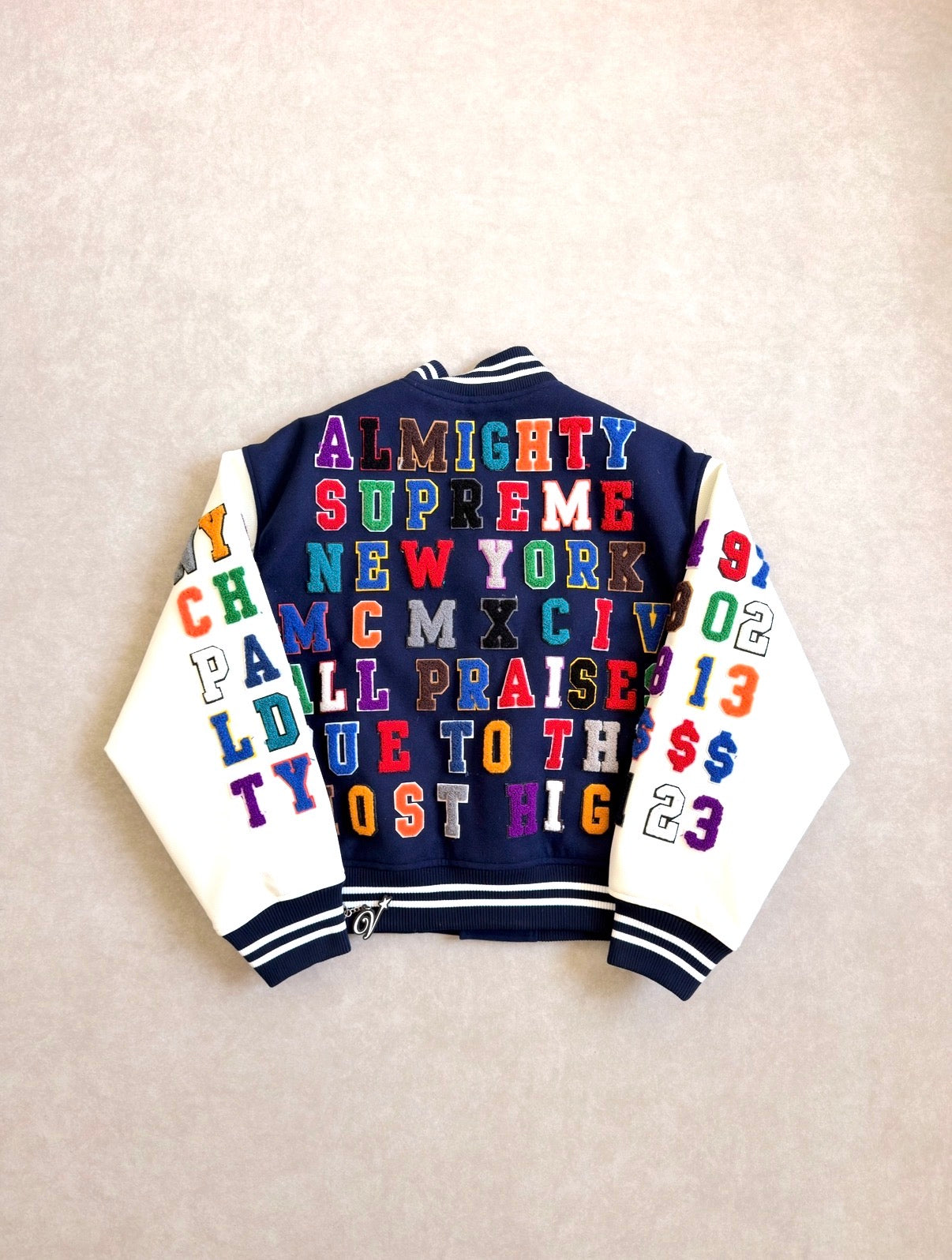 Supreme Praises Varsity Jacket