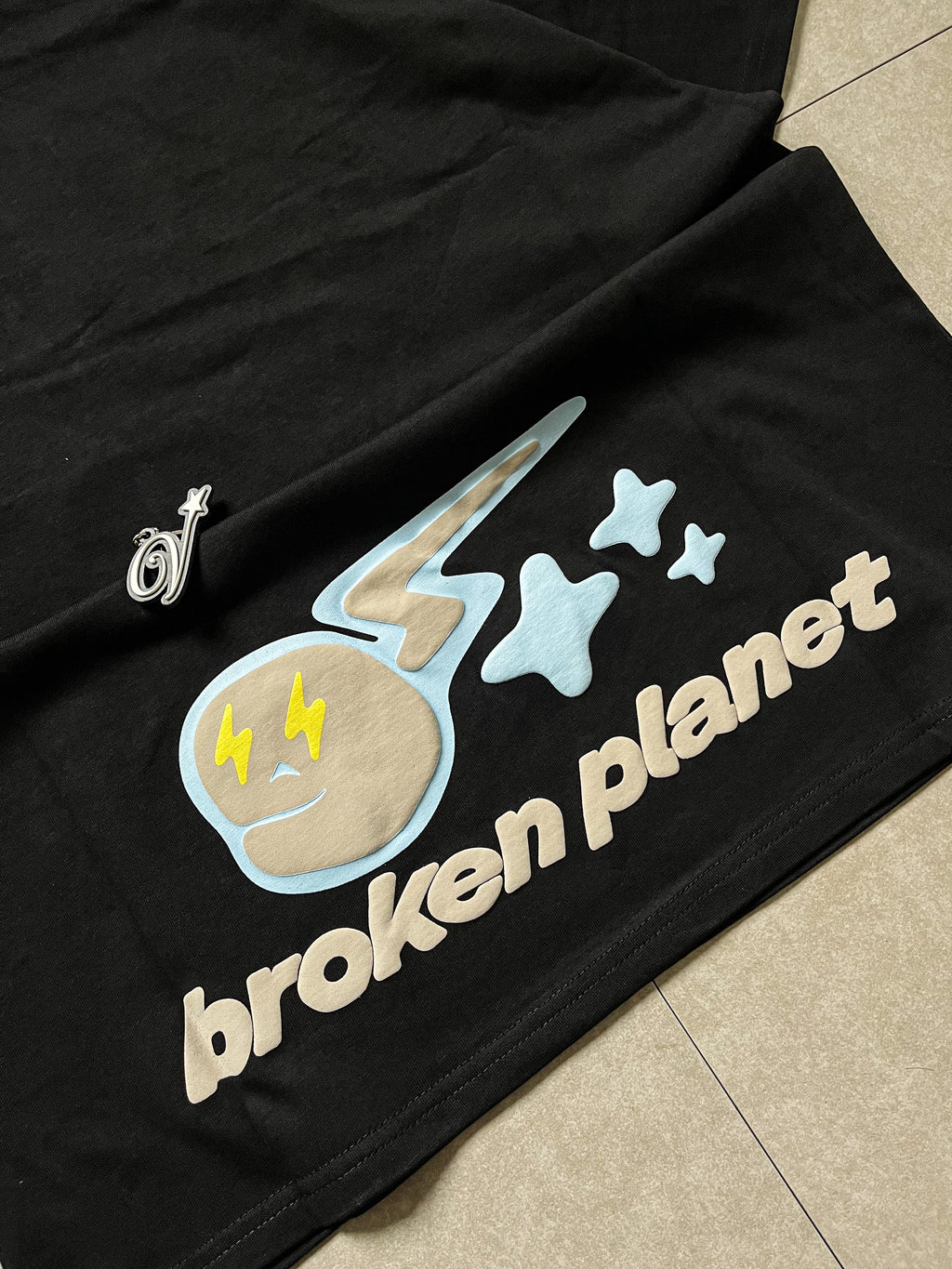 BROKEN PLANET SPEED OF LIGHT TEE