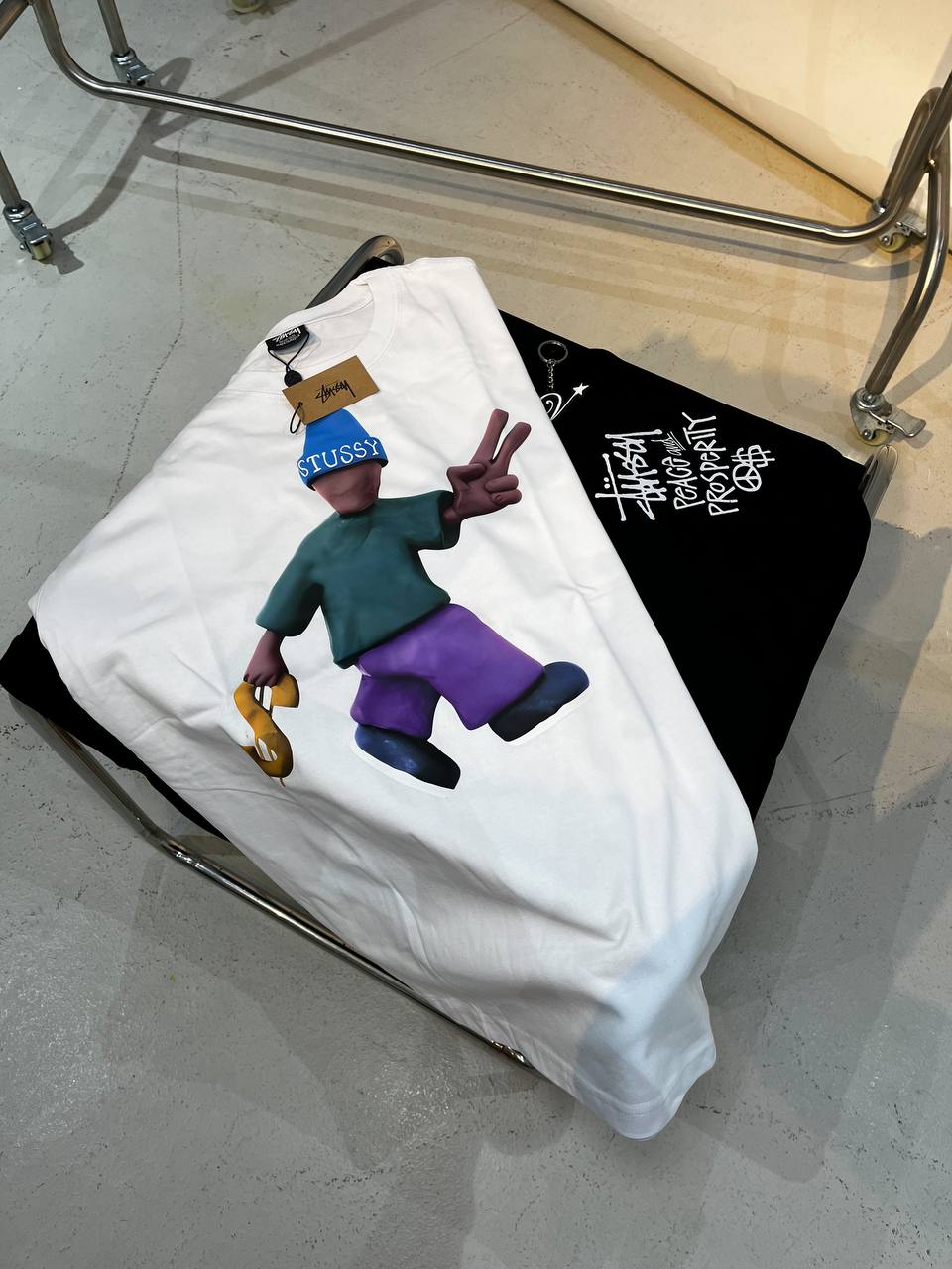 STUSSY PEACE AND PROSPERITY TEE